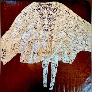 Boho Chic Ivory-colored Crochet Tie-Front cardigan/jacket with dolman sleeves.